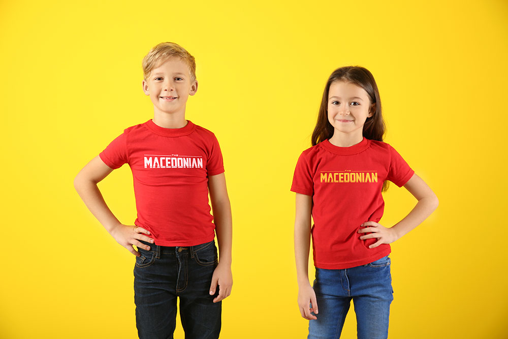 Cute children in t-shirts on color background